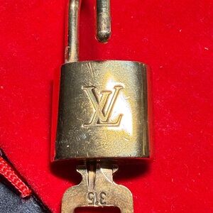 Louis Vuitton Gold Tone Padlock with Key